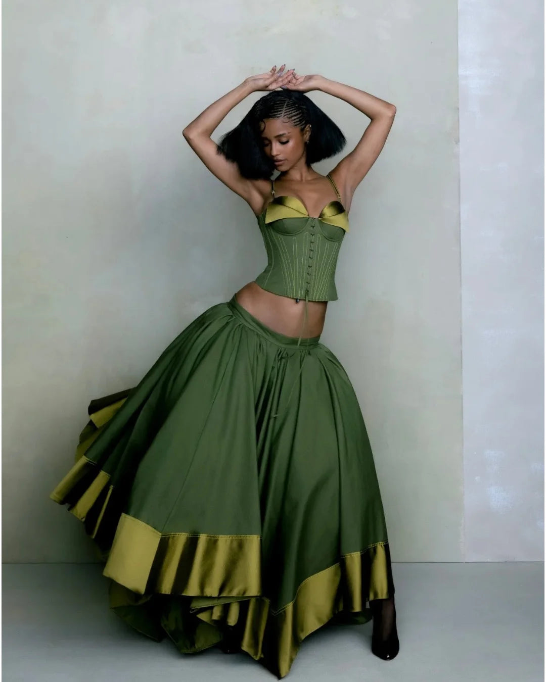 Amstoosh lime green two-piece set — full-length view showing skirt movement