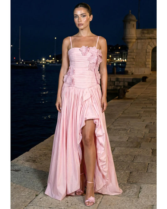 Amstoosh pink spaghetti-strap corset dress with stepped layered hem — on model